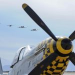 A Heritage Flight formation of A-10 Thunderbolt IIs, a P-38 Lightning and a P-47 Thunderbolt flies over a P-51 Mustang at Davis-Monthan Air Force Base, Arizona. (U.S. Air Force Photograph by Airman 1st Class Mya M. Crosby.)