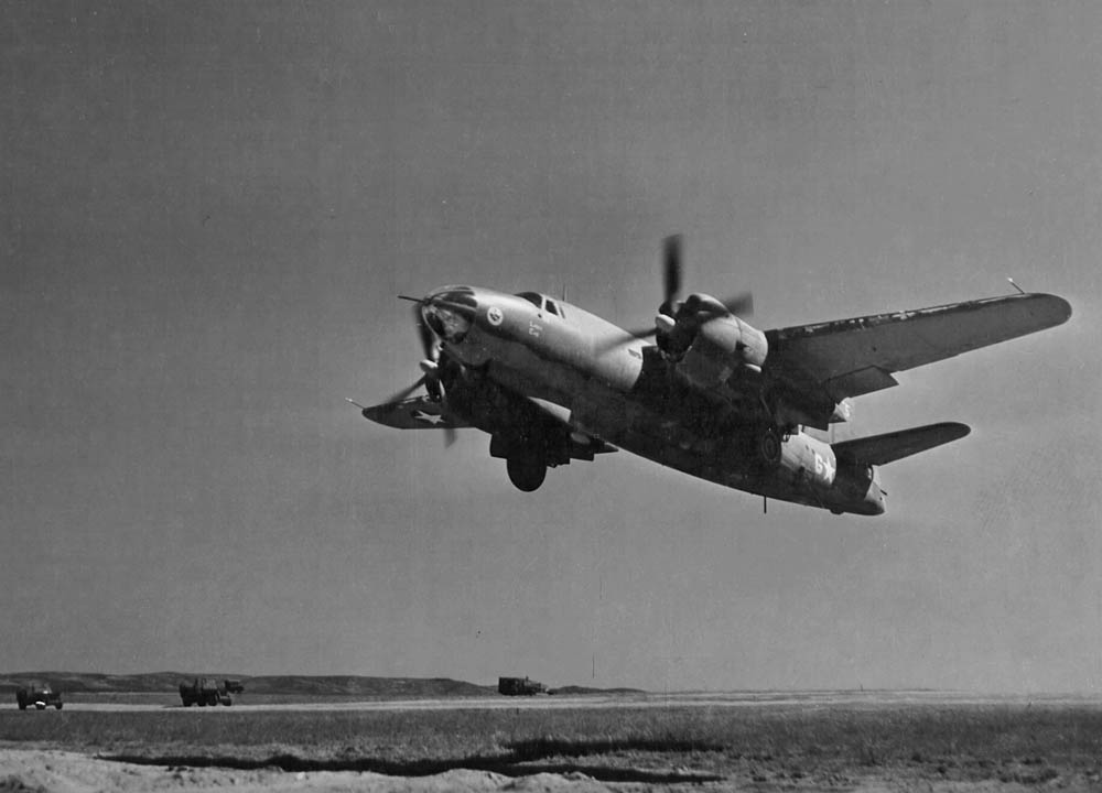 A Martin B-26 Marauder medium bomber takes off for a mission from an airfield somewhere in North Africa. (U.S. Air Force Photograph.)