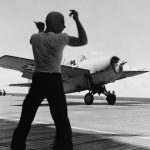 A Grumman F4F-3 Wildcat fighter from Fighting Squadron Three (VF-3) prepares for takeoff on the deck of the aircraft carrier USS Saratoga (CV-3), circa 1941. (U.S. Navy Photograph, U.S. National Archives.)