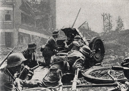 [Figure 59. 3.7-cm Pak in action.]