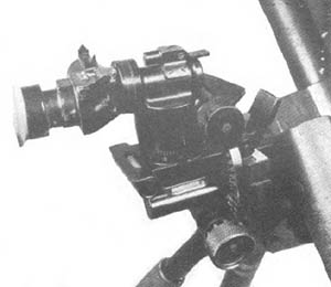 [Figure 288. Panoramic sight for model 94 (1934) mortar has a 3 X magnification and a 13° field of view. Micrometer drums enable readings to be made to the nearest mil.]