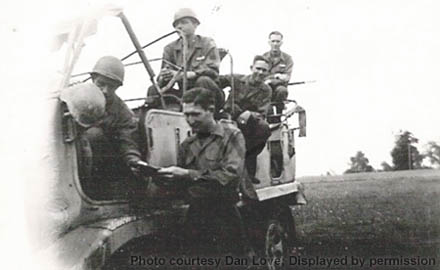 [Captured WWII German Halftrack with GIs of 79th Infantry Division]